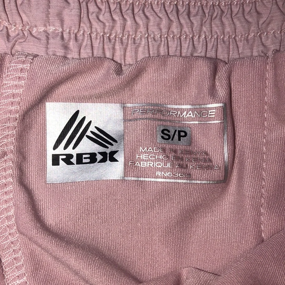 REEBOK pink performance running shorts